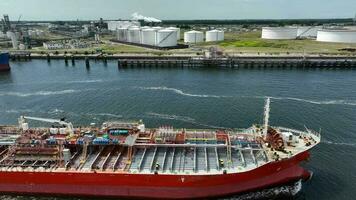 Crude Oil Tanker Ship Arriving into Port to Unload Petrochemicals at a Depot video