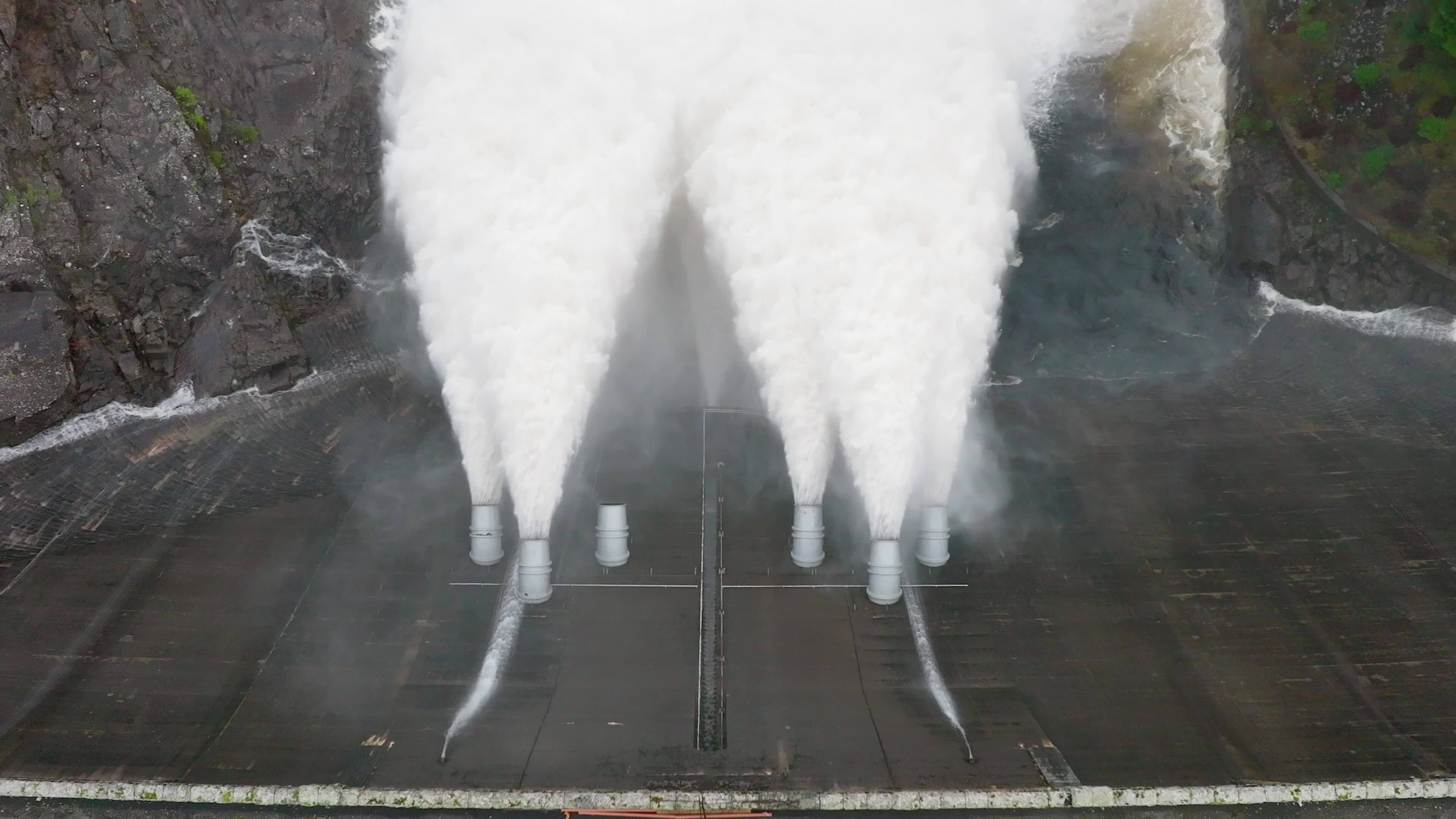Water Pumped Through a Gravity Fed Hydroelectric Power Station Dam
