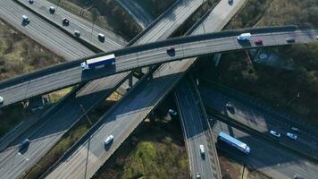 Rush Hour Vehicles Driving on a Highway Interchange Junction Aerial View video