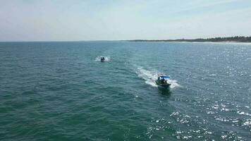 Fishing Tour Boat at Sea Taking Tourists out to Catch Fish in Mexico video