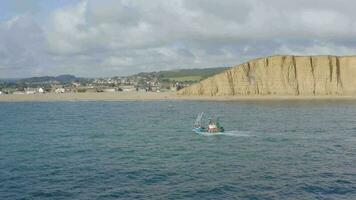 A Commercial Fishing Vessel at Sea in the UK video