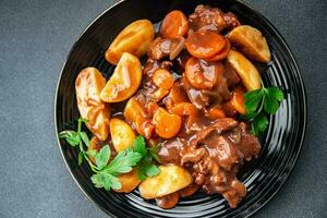 beef bourguignon beef stew fresh dish meal food snack on the table copy space food background rustic top view photo