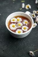 tea chamomile flower drink meal food snack on the table copy space food background rustic top view photo