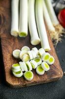 leeks cut into pieces fresh vegetable healthy meal food snack on the table copy space food background rustic top view keto or paleo diet veggie vegan or vegetarian food photo