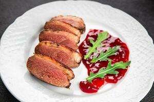 roasted duck breast meat poultry meal food snack on the table copy space food background rustic top view photo