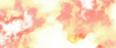 red and yellow background, abstract watercolor background with space. colorful sunrise or sunset colors in cloudy shapes. beautiful hues of yellow gold and pink in hand painted watercolor background photo