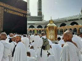 Mecca, Saudi Arabia, April 2023 - Pilgrims from all over the world are present in the courtyard of Masjid al-Haram for Tawaf. photo