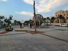 Jeddah, Saudi Arabia, April 2023 - Beautiful evening view of Jeddah Corniche. A large number of people are seen in the park of Jeddah Corniche. photo