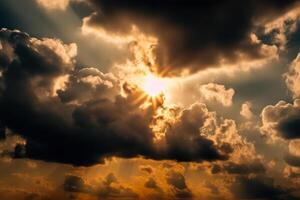 the bright sun comes out from behind the clouds, dramatic sky photo