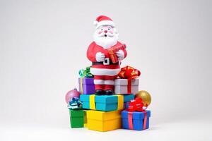 Santa Claus with gift boxes on white background, copy space isolate. . photo