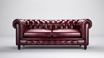 Sofa chesterfield from burgundy leather on a white background, isolate. . photo