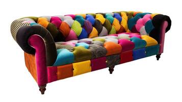 Chesterfield sofa from multi-colored fabric, patchwork, on a white background. . photo