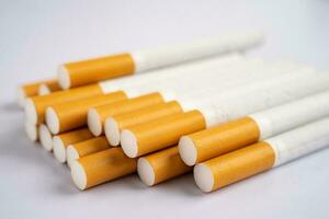 Cigarette, tobacco in roll paper with filter tube, No smoking concept. photo