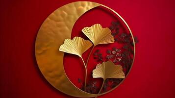 Shiny gold brass metal art, chinese style ginkgo leaf in circle outline, symbol of love and peace on bright red background. photo