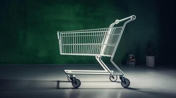 Matte white modern supermarket shopping cart trolley against blank sage green wall background. photo