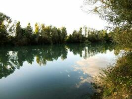 By the riverbank photo