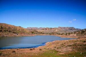 Scenic mountain lake view photo