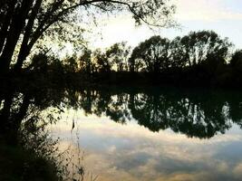 By the riverbank photo