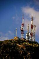 Radio antennas on the hill photo