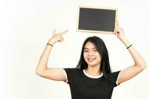 Showing, Presenting and holding Blank Blackboard Of Beautiful Asian Woman Isolated On White photo