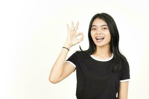 Smiling and Showing OK Sign Of Beautiful Asian Woman Isolated On White Background photo