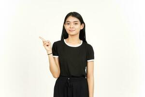 Showing Product and Pointing Side using forefinger Of Beautiful Asian Woman Isolated On White photo