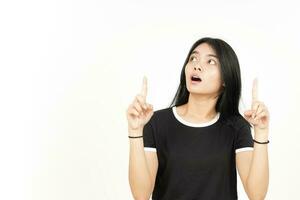Shocked Face And Pointing Up showing blank copy space Of Beautiful Asian Woman Isolated On White photo
