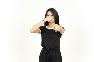 Smelling something stinky and disgusting of Beautiful Asian Woman Isolated On White Background photo
