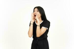 Making Announcement with hands over mouth Of Beautiful Asian Woman Isolated On White Background photo