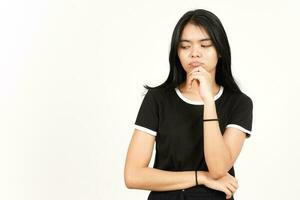 Looking down and thinking gesture f Beautiful Asian Woman Isolated On White Background photo