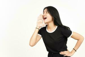 Making Announcement with hands over mouth Of Beautiful Asian Woman Isolated On White Background photo