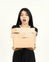 Holding Package Box or Cardboard Box Of Beautiful Asian Woman Isolated On White Background photo