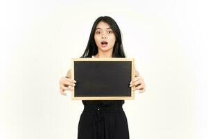 Showing, Presenting and holding Blank Blackboard with Shocked Face Of Beautiful Asian Woman photo