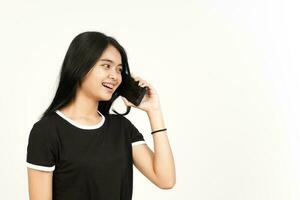 Make a Phone Call Using smartphone with happy face Of Beautiful Asian Woman Isolated On White photo