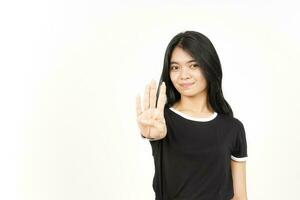 Showing count Four finger Of Beautiful Asian Woman Isolated On White Background photo