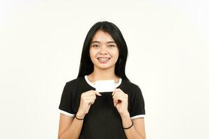 Holding Blank Bank Card Or Credit Card Of Beautiful Asian Woman Isolated On White Background photo