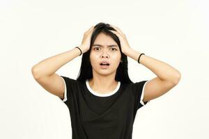 Hands On Head With Shocked Face Expression Of Beautiful Asian Woman Isolated On White Background photo