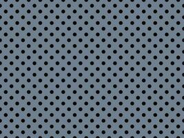 black polka dots over slate gray background photo