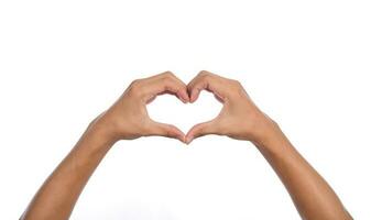 Man hands making a heart shape on a white isolated background photo