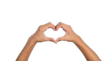 Man hands making a heart shape on a white isolated background photo