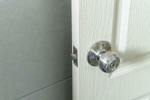 Roundly door knob lock handle home security close. The doorknob is being found that caused the COVID 19 infection. photo