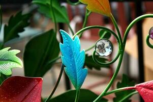 Whimsical Metal Vine and Leaf Garden Sculpture photo