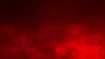 fogo nuvens fumaça com vermelho cor sobre Preto fundo video