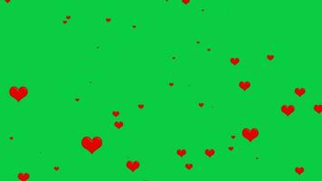 rosso cuore forma icona volante su animazione su verde schermo sfondo, lotto di rosso gli amori forma volante particelle movimento grafico animato croma chiave 4k video