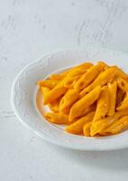 Pasta with cheese sauce photo