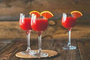 Three glasses of Mimosa cocktail photo