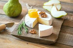 Camembert cheese with pears photo