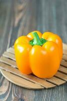 Bell pepper on the wooden board photo