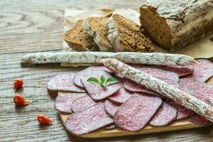 Salami with bread photo