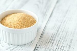 Bowl of coconut sugar photo